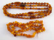 Appraisal: A mixed lot comprising two amber necklaces longest approx cm