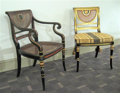 Appraisal: Two Regency style painted and ebonized chairs Each with a