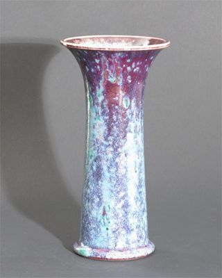 Appraisal: A Ruskin Pottery high-fired stoneware vase cylindrical form with everted