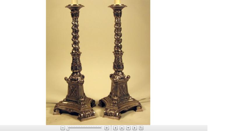 Appraisal: Pair of Continental silvered metal candlesticksEach with a twisted stem