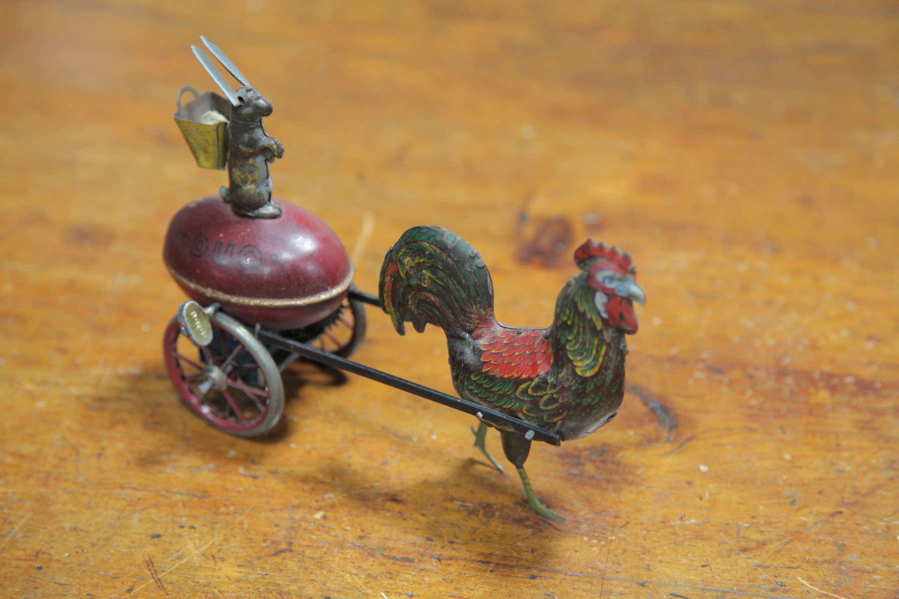 Appraisal: LEHMAN DUO WIND-UP German early th century Lithographed tin rooster