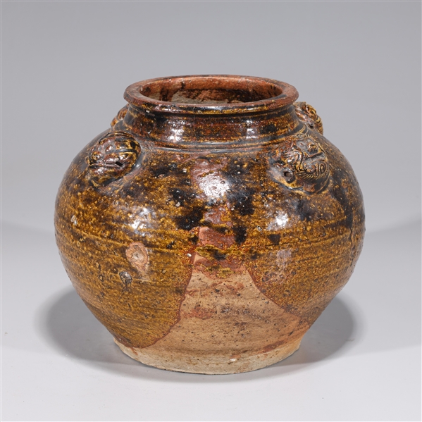 Appraisal: Chinese Yuan dynasty glazed jar with mask handles as-is condition