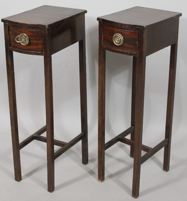 Appraisal: A pair of Edwardian mahogany side tables each bow fronted