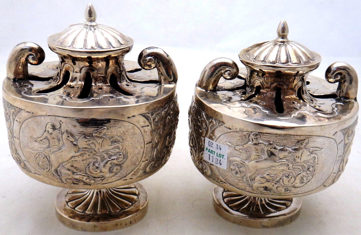 Appraisal: A pair of silver pot pourri urns each of twin