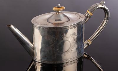 Appraisal: A George III silver teapot HC London of oval form