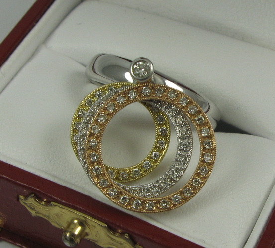 Appraisal: DIAMOND AND K ROSE YELLOW AND WHITE GOLD RING gross