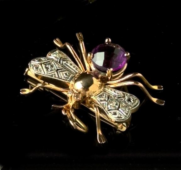 Appraisal: Fourteen-Karat Yellow Gold Platinum Diamond and Amethyst Bee Brooch containing