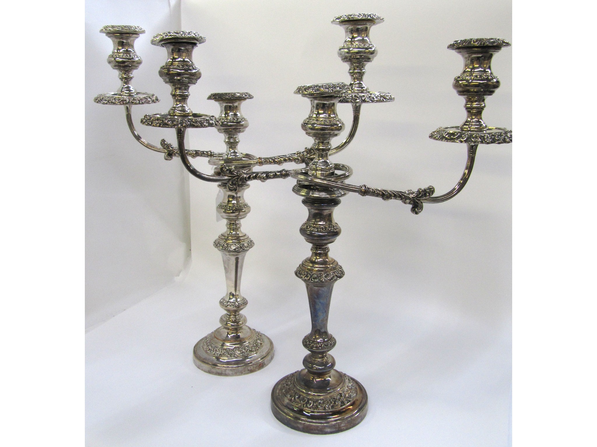 Appraisal: A pair of silver plated -branch candelabra