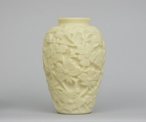 Appraisal: Consolidated Custard Glass Dogwood Vase Blown and molded custard glass