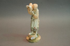 Appraisal: A Royal Worcester figure of a water carrier