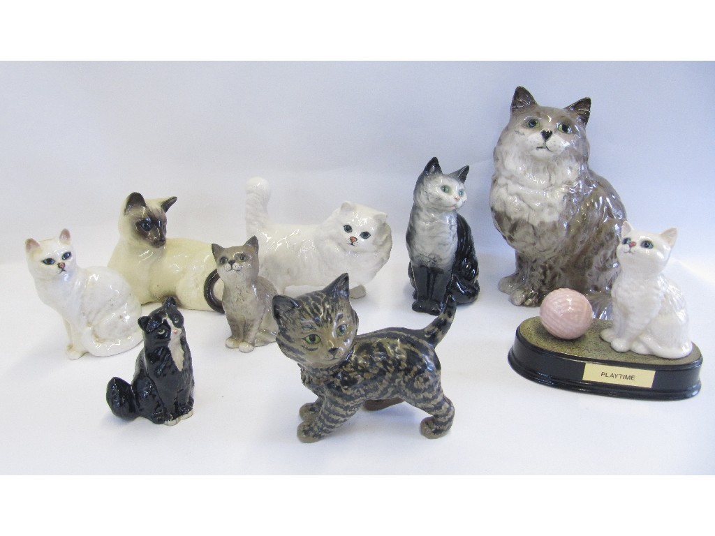 Appraisal: Nine Beswick cats including Persian Persian Kitten grey striped Siamese