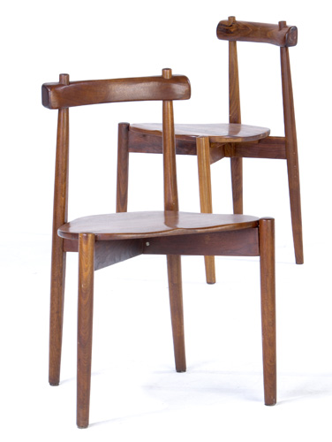 Appraisal: CLARENCE TEED Pair of sculpted walnut side chairs x x