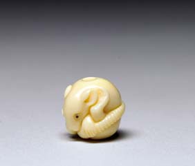 Appraisal: CONTEMPORARY IVORY OJIME Finely executed contemporary carved ivory ojime bead