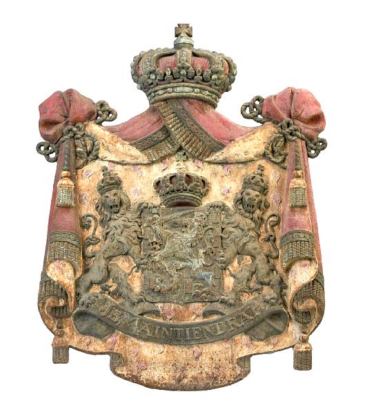 Appraisal: A paint decorated cast iron coat of arms of the