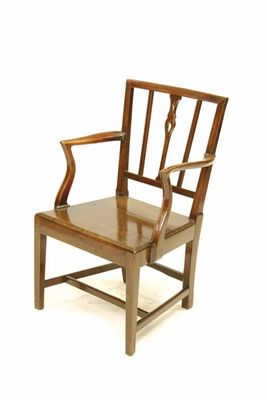 Appraisal: A George III fruitwood open armchair the tapered rectangular back