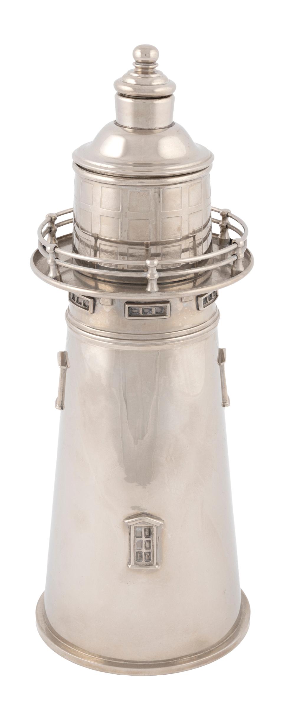 Appraisal: SILVER PLATED LIGHTHOUSE COCKTAIL SHAKER CONTEMPORARY HEIGHT SILVER PLATED LIGHTHOUSE