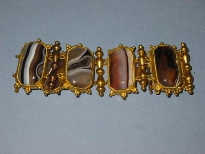 Appraisal: A VICTORIAN AGATE BRACELET having six canted oblong polished striped