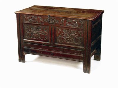 Appraisal: A late th century oak mule chest the moulded edge