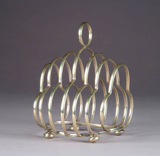 Appraisal: ENGLISH SILVER PLATED TOAST RACK Marked Made in England D