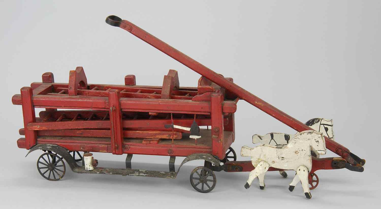 Appraisal: PAINTED WOOD AND METAL HORSE-DRAWN FIRE WAGON PULL-TOYEarly th CenturyTwo