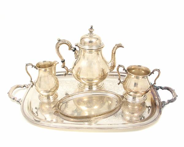 Appraisal: A sterling three piece tea set with associated small tray