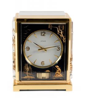 Appraisal: A JAEGER-LECOULTRE BRASS ATMOS MARINA CLOCKLate th centuryWith lucite panels