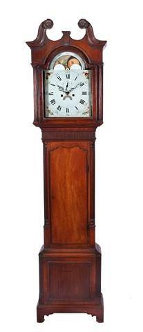 Appraisal: A GEORGE III MAHOGANY LONG CASE CLOCK with break arch