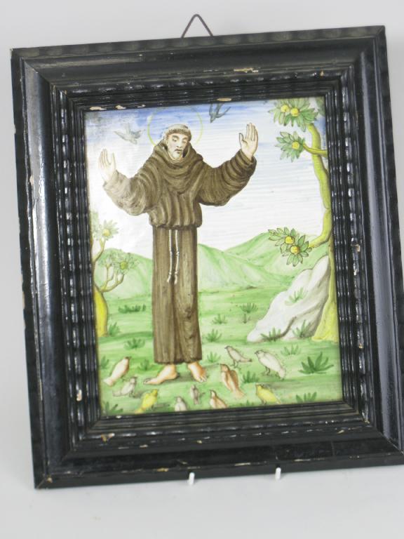 Appraisal: A late th Century Italian maiolica Plaque with St Francis