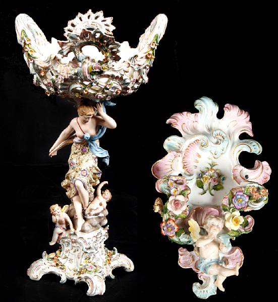 Appraisal: A German porcelain figural centerpiece together with a wall plaque