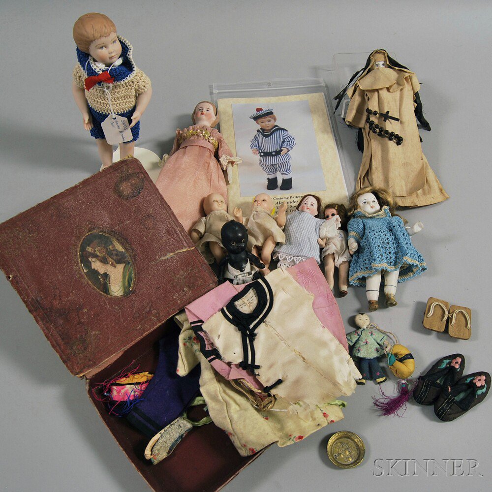 Appraisal: Group of Nine Bisque Dolls comprising one boy doll with