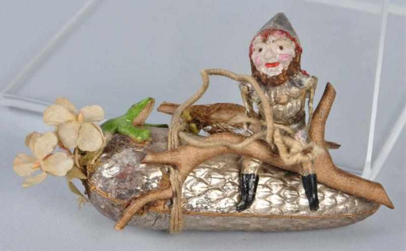 Appraisal: Dresden Gnome on Pinecone Christmas Ornament Description German With frog