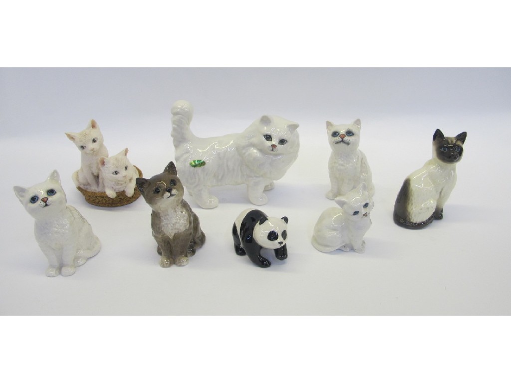 Appraisal: Beswick white Persian cat kittens Siamese cat panda and a