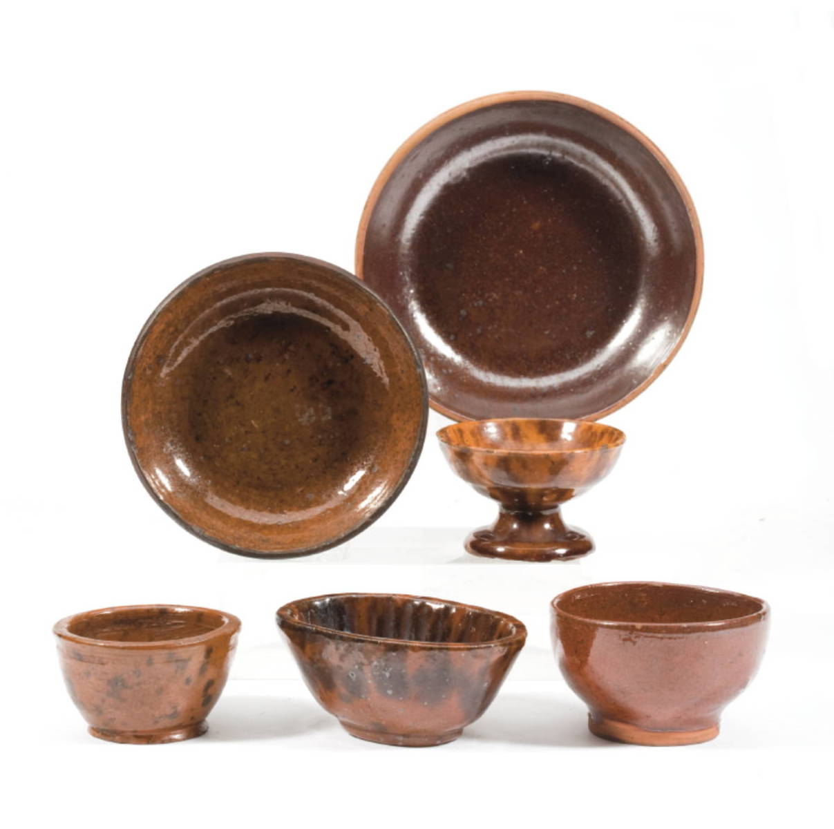 Appraisal: SIX GLAZED REDWARE OBJECTS PENNSYLVANIA OR NEW ENGLAND MID-NINETEENTH-TWENTIETH CENTURY