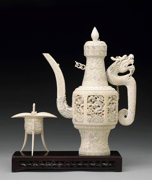 Appraisal: A pieced ivory covered ewer and libation cup The ewer