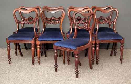 Appraisal: A set of nine Victorian mahogany balloon back dining chairs