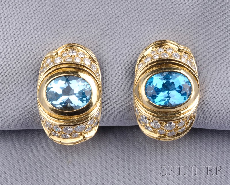 Appraisal: kt Gold Blue Topaz and Diamond Earclips Marina B set