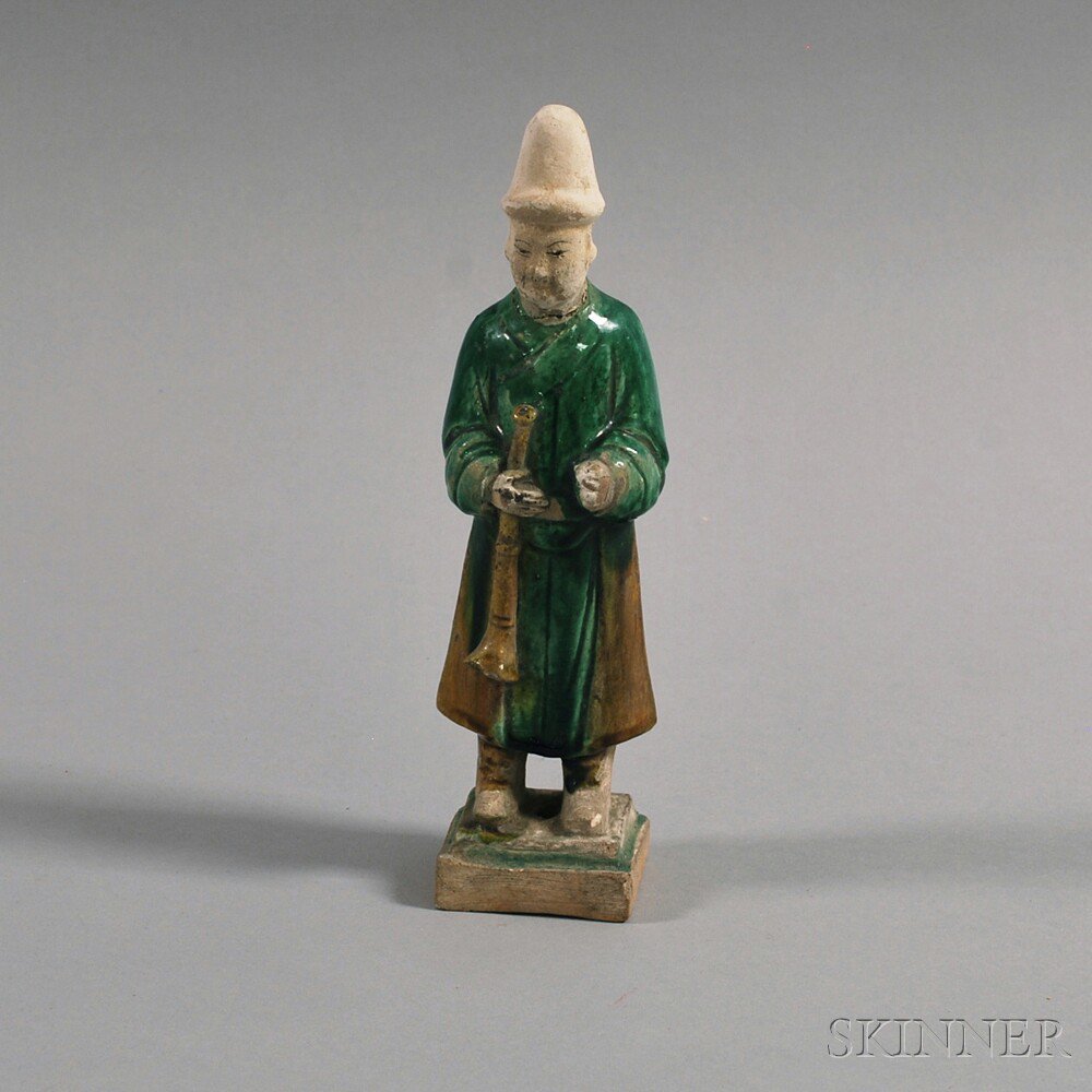 Appraisal: Standing Figure China Tang Dynasty style a musician decorated with