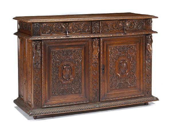 Appraisal: An Italian Renaissance style walnut credenza early th century The