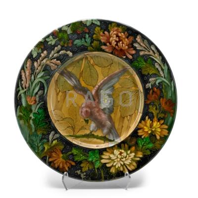 Appraisal: CONTINENTAL MAJOLICA CHARGER Bird with outspread wings on a branch