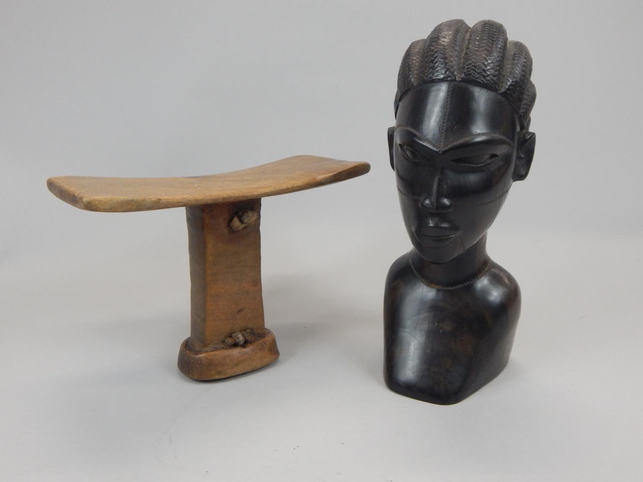 Appraisal: Tribal Art A carved African head rest with woven hide