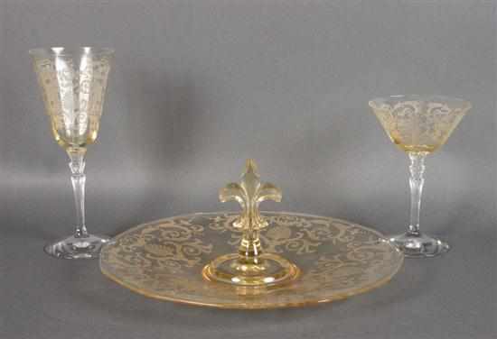 Appraisal: Fostoria engraved glass wine stems and matching hors d'oeuvre plate