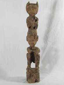 Appraisal: An Indonesian tribal carved wooden figure probably th c Ht