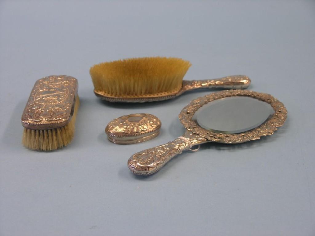 Appraisal: A Victorian silver dressing table set consisting of bevelled hand