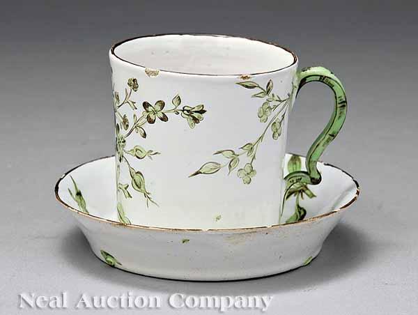 Appraisal: A Fine French Fa ence Cup and Saucer probably mid-