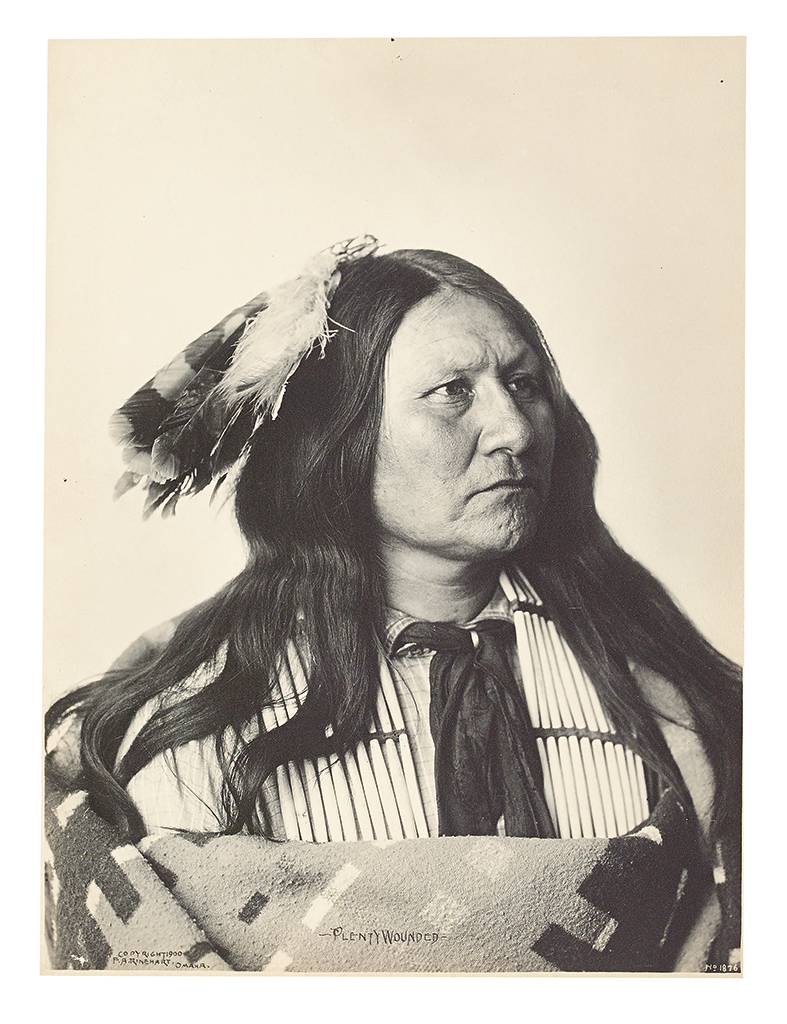 Appraisal: AMERICAN INDIANS--PHOTOGRAPHS Rinehart Frank A Plenty Wounded Platinum print x