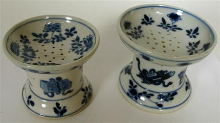 Appraisal: Two similar Chinese blue painted porcelain pounce pots Kangxi period