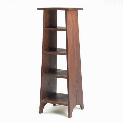 Appraisal: Arts Crafts tapering magazine stand with four shelves and carved