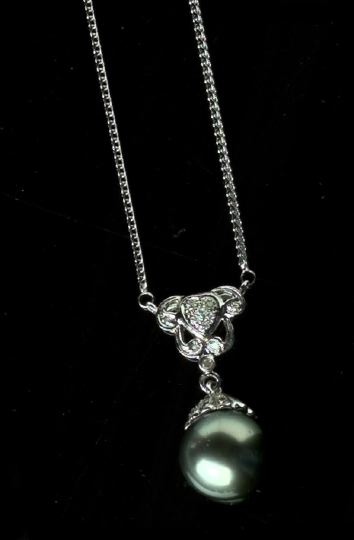 Appraisal: Fourteen-Karat White Gold Diamond and Black Tahitian Pearl Pendant Necklace