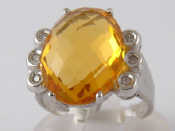 Appraisal: A white metal tests carat gold citrine and diamond ring