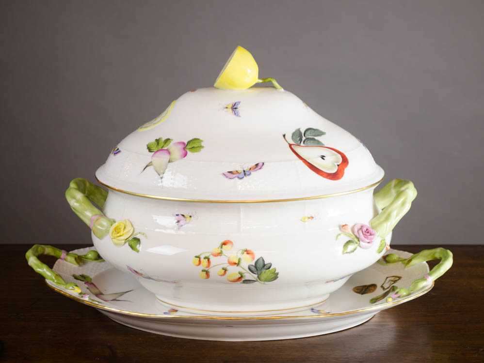 Appraisal: HEREND 'FRUITS FLOWERS LIDDED TUREEN AND UNDER PLATE the oval